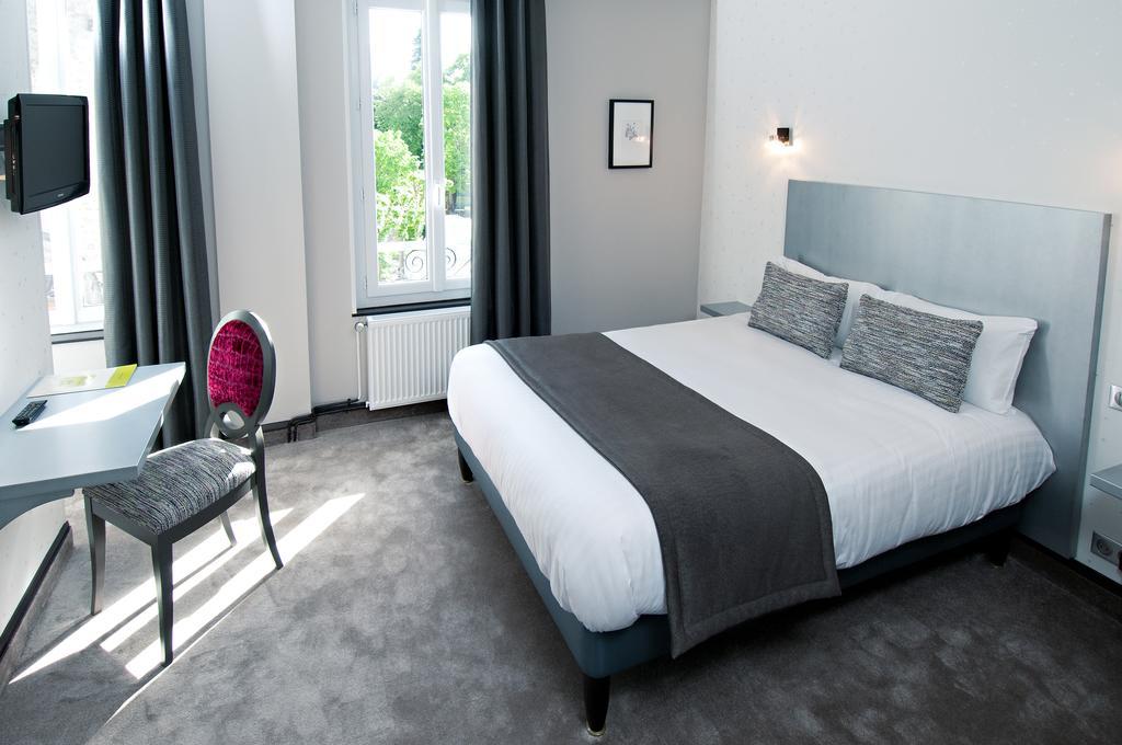 Logis Hotel Restaurant Nougier Saint-Étienne-de-Fursac Habitación foto